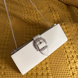 Brand New Jimmy Choo Off White Clutch with Shoulder Strap. Brand New with tags.